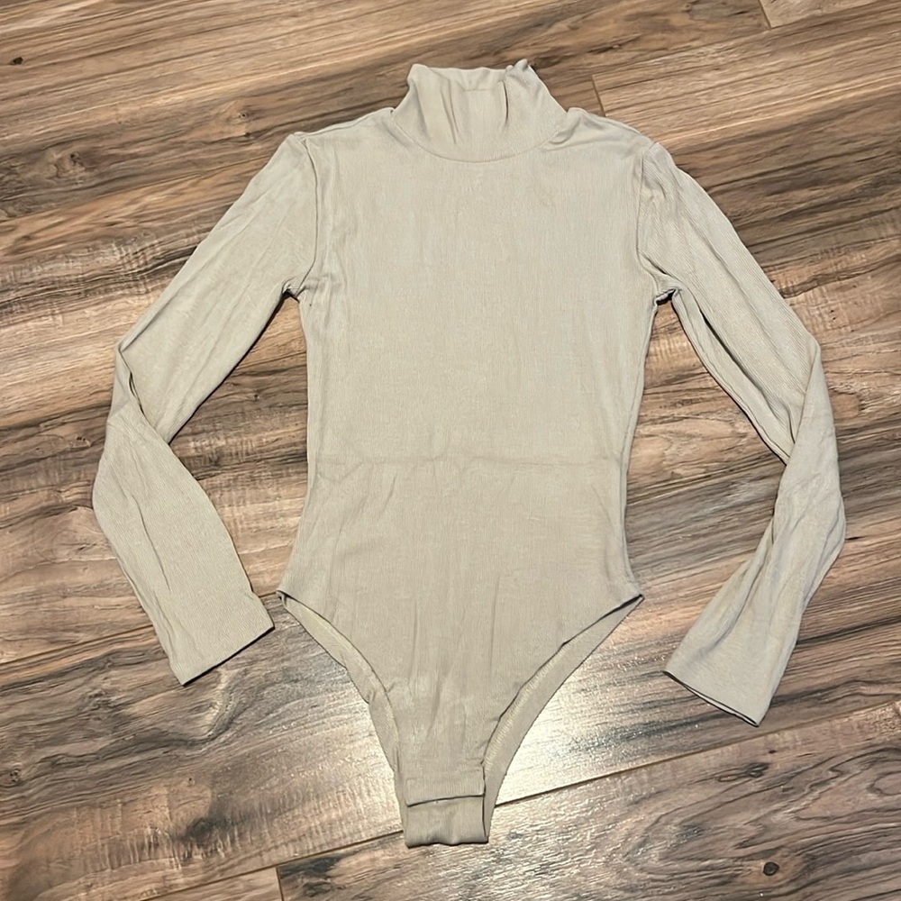 Amazon Women’s Tan Turtle neck bodysuit Size Small